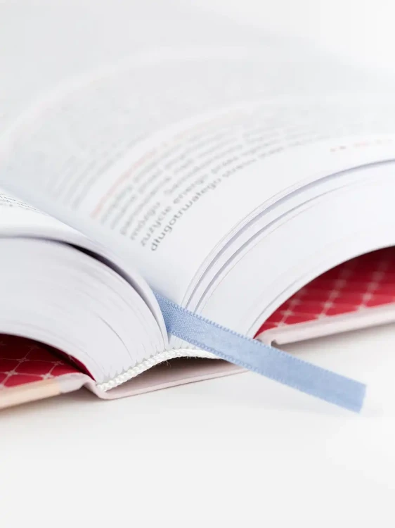 Mums to Mums vol. II — open pages and ribbon